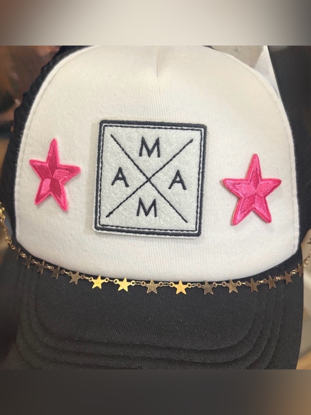 Black and white Trucker Hat with Pink Star and gold star chain.